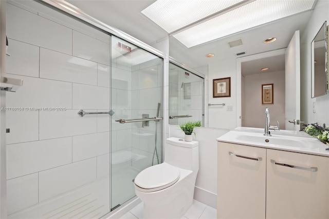 12950 SW 4th Ct Unit 309H, Pembroke Pines, FL 33027 - full bathroom featuring visible vents, a stall shower, toilet, and vanity