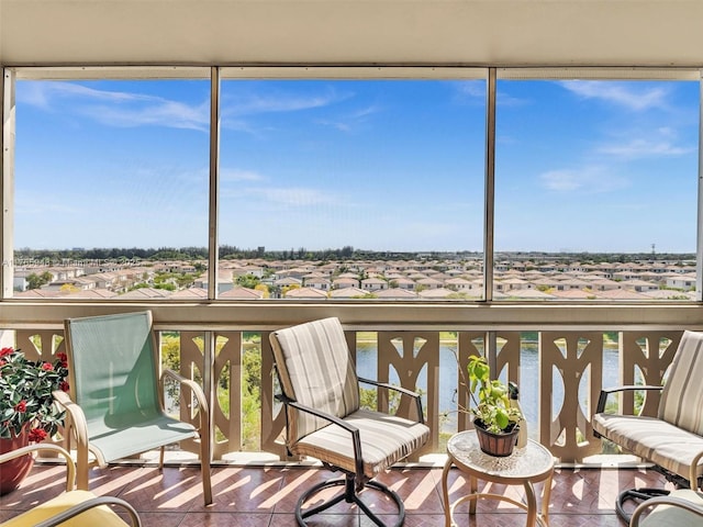 800 NE 195th St Unit 716, Miami, FL 33179 - unfurnished sunroom featuring a residential view