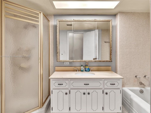 800 NE 195th St Unit 716, Miami, FL 33179 - bathroom featuring vanity, a shower stall, and a washtub