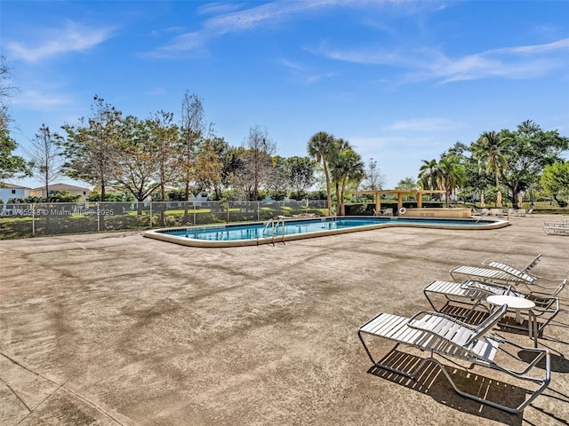 800 NE 195th St Unit 716, Miami, FL 33179 - community pool featuring a patio area and fence