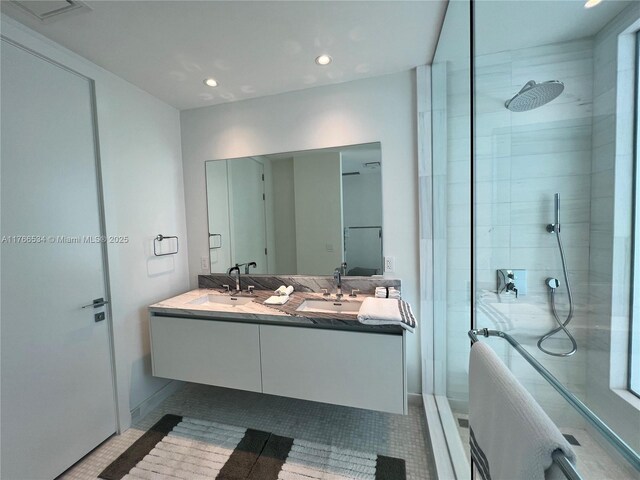 700 NE 26th Ter Unit 2205, Miami, FL 33137 - full bath featuring a sink, tile patterned flooring, and a tile shower