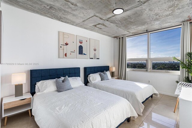 tiled bedroom with baseboards
