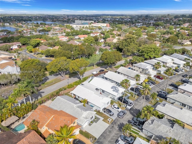 aerial view featuring a residential view and a water view