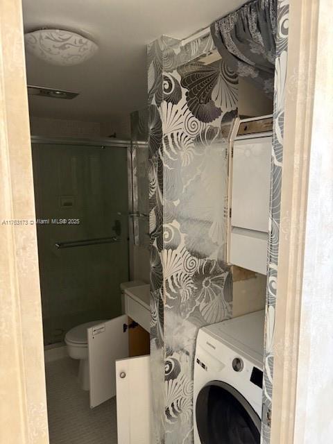 3701 N Country Club Dr Unit 207, Aventura, FL 33180 - clothes washing area with tile patterned floors and washer / dryer