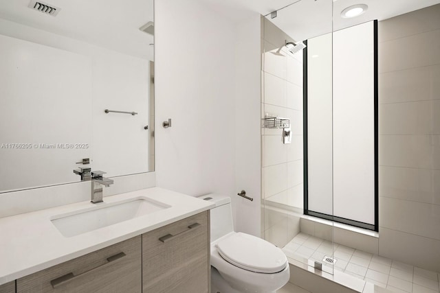 full bath with visible vents, vanity, toilet, and a shower stall