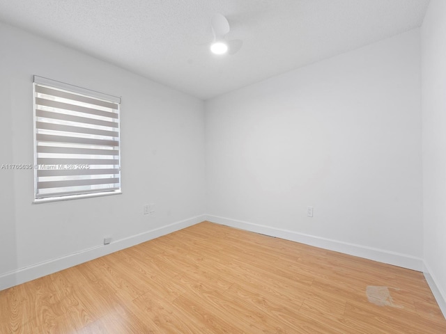 13481 SW 103rd St, Miami, FL 33186 - spare room with baseboards and light wood-style flooring