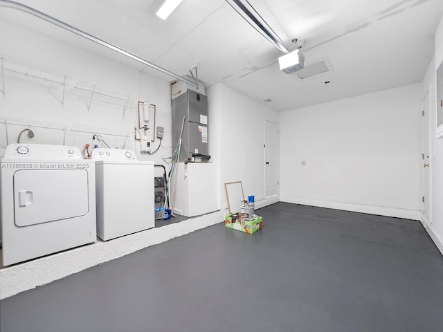13481 SW 103rd St, Miami, FL 33186 - garage with heating unit, independent washer and dryer, and a garage door opener