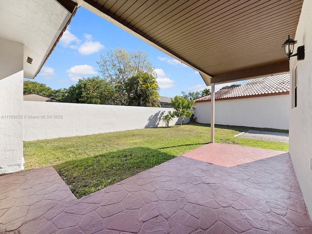 13481 SW 103rd St, Miami, FL 33186 - view of yard with a fenced backyard and a patio area