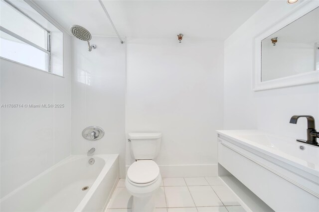 bathroom with vanity, baseboards, tile patterned flooring, shower / bathing tub combination, and toilet