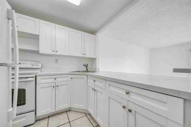 kitchen featuring light tile patterned floors, open shelves, electric range, a sink, and white cabinetry