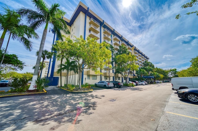 view of property with uncovered parking