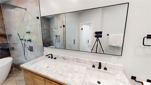 full bathroom with a stall shower and a sink