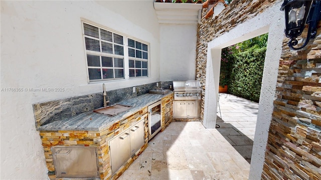 view of patio with a grill and area for grilling