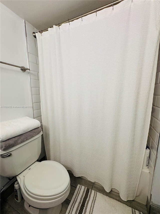 full bathroom with toilet