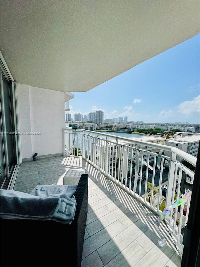balcony featuring a view of city