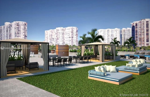 surrounding community featuring an outdoor living space, a gazebo, a view of city, and a yard
