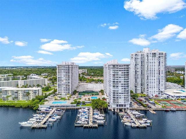drone / aerial view with a water view and a view of city