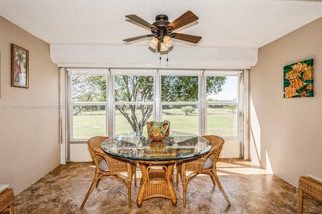 1045 Country Club Dr Unit 304, Margate, FL 33063 - dining room featuring a ceiling fan and a healthy amount of sunlight