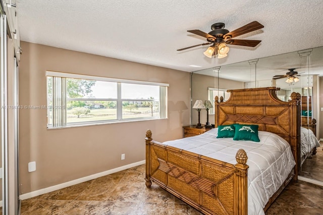 1045 Country Club Dr Unit 304, Margate, FL 33063 - bedroom featuring baseboards and a textured ceiling