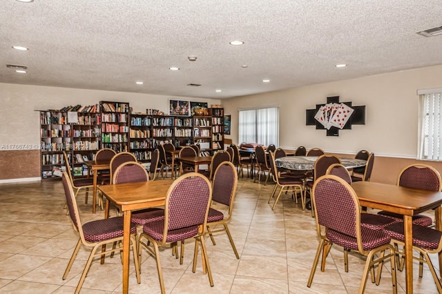 1045 Country Club Dr Unit 304, Margate, FL 33063 - dining area with light tile patterned floors, recessed lighting, visible vents, and a textured ceiling