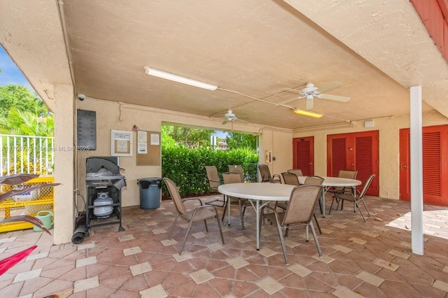 1045 Country Club Dr Unit 304, Margate, FL 33063 - view of patio / terrace featuring outdoor dining area, a grill, and a ceiling fan