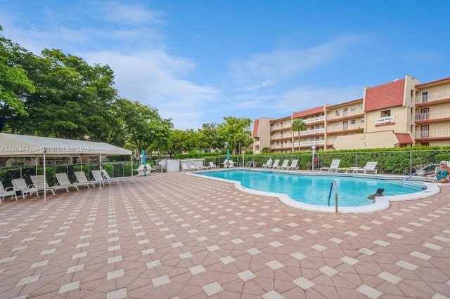 1045 Country Club Dr Unit 304, Margate, FL 33063 - pool featuring a patio and fence