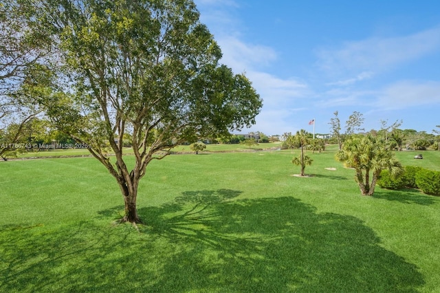 1045 Country Club Dr Unit 304, Margate, FL 33063 - view of community featuring a lawn
