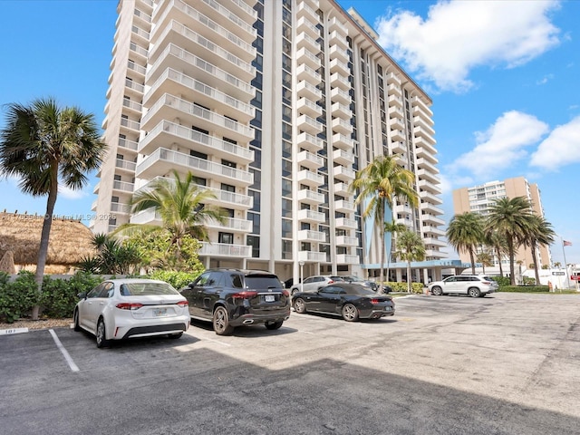 view of property featuring uncovered parking