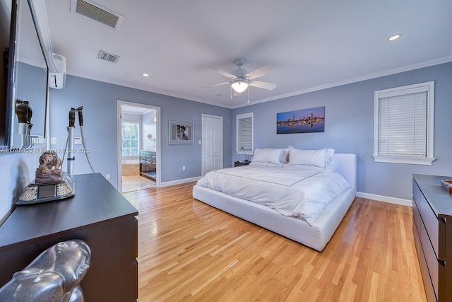 bedroom featuring light wood-type flooring, ornamental molding, baseboards, and visible vents