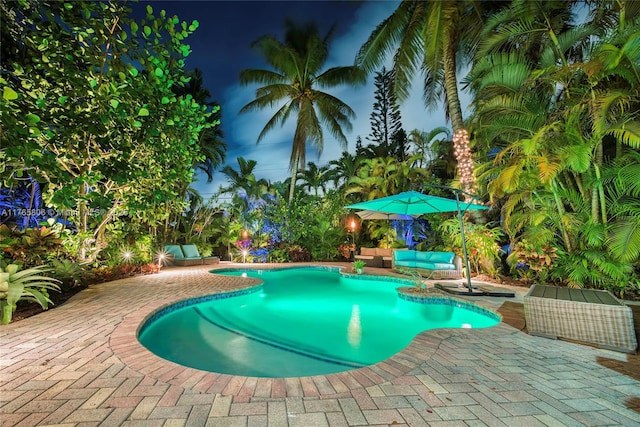 pool featuring a patio area