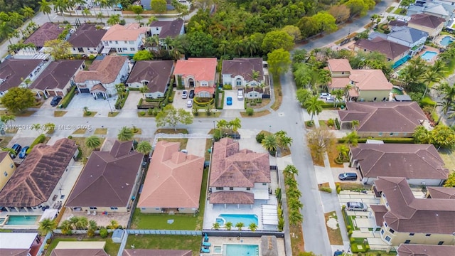 14995 SW 12th Ln, Miami, FL 33194 - aerial view of property and surrounding area featuring nearby suburban area and a pool area