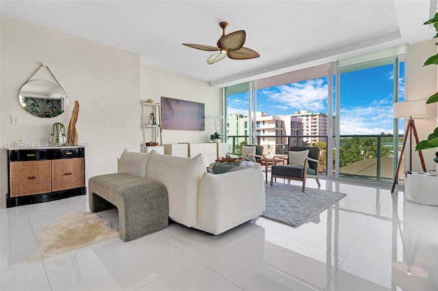 1150 102nd St Unit 501, Bay Harbor Islands, FL 33154 - tiled living room with expansive windows and ceiling fan