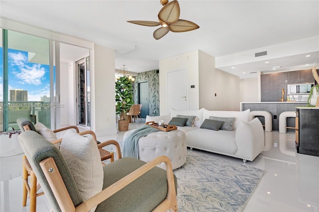 1150 102nd St Unit 501, Bay Harbor Islands, FL 33154 - living area with a ceiling fan and healthy amount of natural light