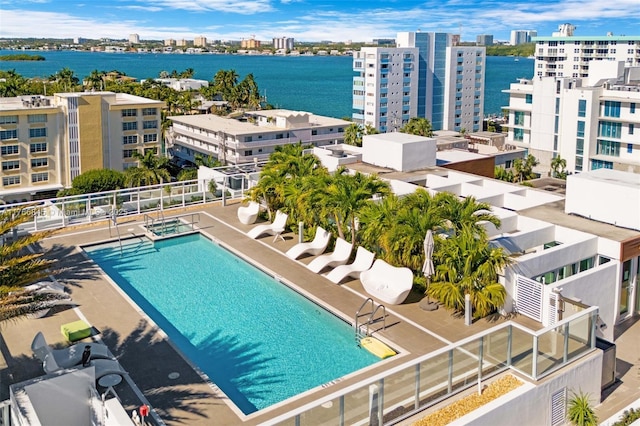 1150 102nd St Unit 501, Bay Harbor Islands, FL 33154 - community pool featuring a view of city, a community hot tub, and a water view