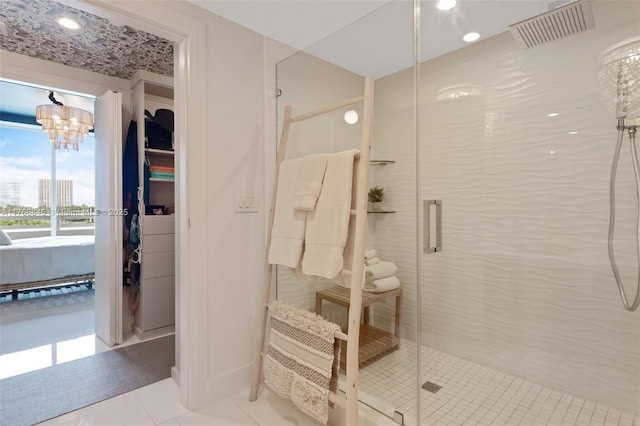 1150 102nd St Unit 501, Bay Harbor Islands, FL 33154 - bathroom with a shower stall, tile patterned floors, and a chandelier