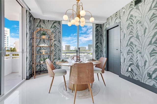 1150 102nd St Unit 501, Bay Harbor Islands, FL 33154 - tiled dining room featuring wallpapered walls, a city view, a chandelier, and expansive windows