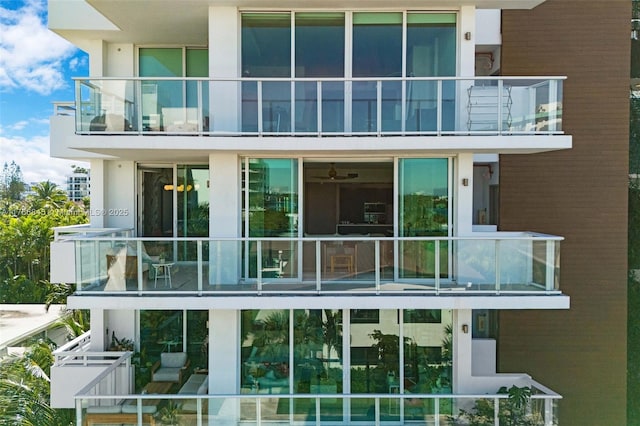 1150 102nd St Unit 501, Bay Harbor Islands, FL 33154 - back of property featuring a balcony and stucco siding