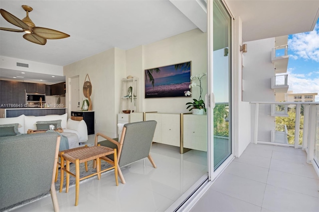 1150 102nd St Unit 501, Bay Harbor Islands, FL 33154 - tiled living area featuring ceiling fan