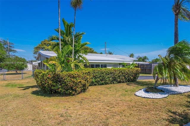 view of yard with fence
