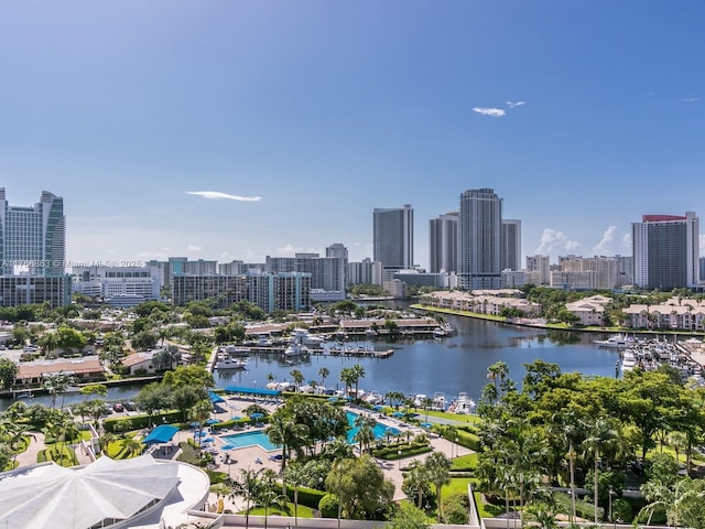 aerial view featuring a view of city and a water view