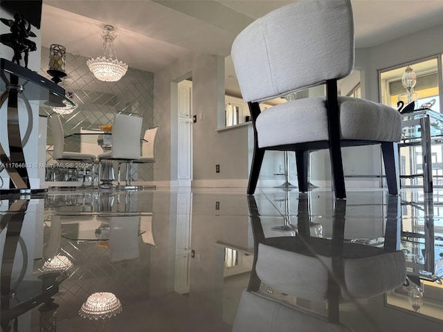 dining space with a chandelier