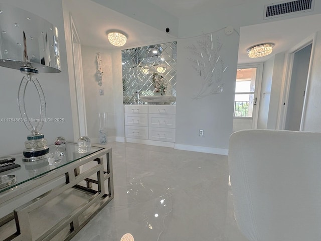 3836 Via Poinciana Unit 604, Lake Worth, FL 33467 - corridor featuring marble tiled flooring