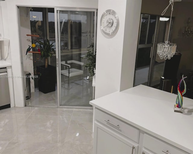 3836 Via Poinciana Unit 604, Lake Worth, FL 33467 - interior space featuring marble tiled flooring and a chandelier