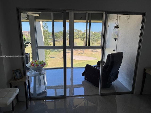 doorway to outside featuring a wealth of natural light