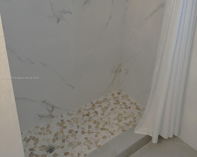 3836 Via Poinciana Unit 604, Lake Worth, FL 33467 - bathroom with a shower with curtain and tile patterned flooring