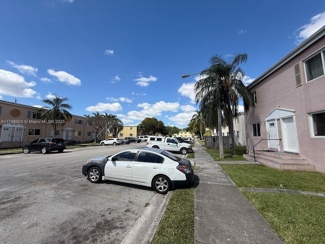 417 NW 84th St Unit 417, Miami, FL 33150 - view of street featuring street lights, curbs, sidewalks, and a residential view