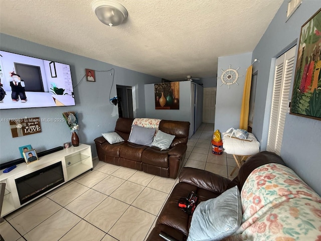 417 NW 84th St Unit 417, Miami, FL 33150 - tiled living room with a textured ceiling