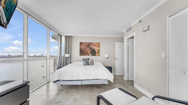 bedroom with visible vents, baseboards, crown molding, and expansive windows