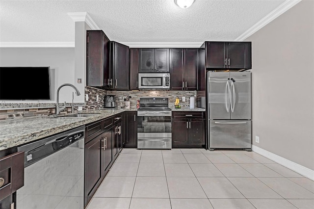 772 NW 132nd Ave, Plantation, FL 33325 - kitchen featuring a sink, tasteful backsplash, appliances with stainless steel finishes, crown molding, and light stone countertops