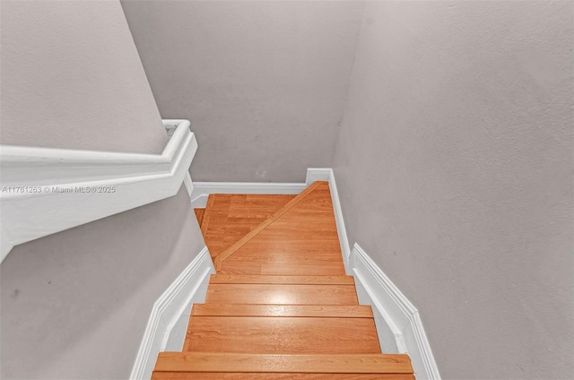 772 NW 132nd Ave, Plantation, FL 33325 - staircase featuring baseboards and wood finished floors